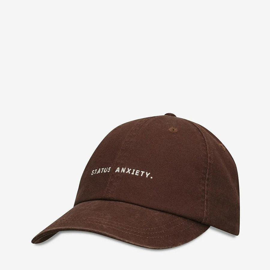 Status Anxiety Under the Sun Cap